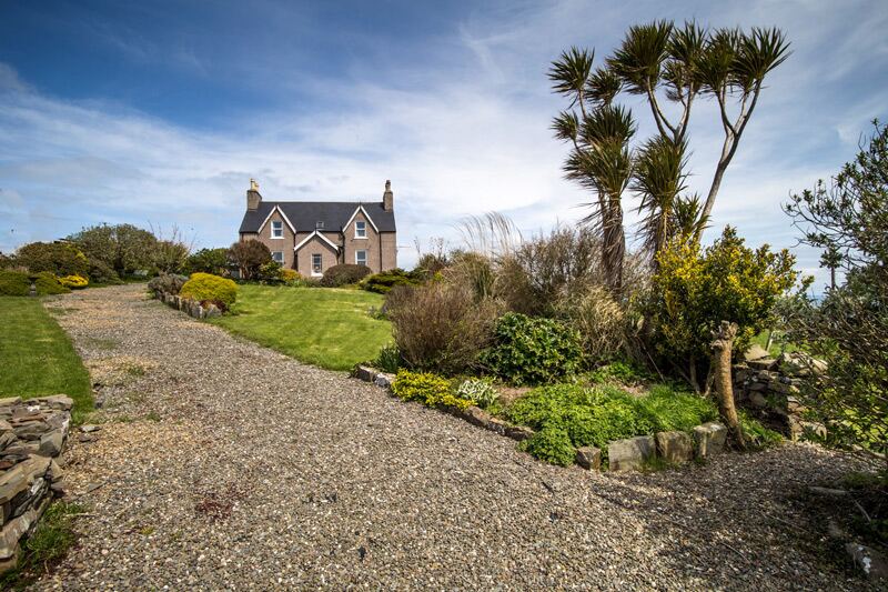 A Galloway farmhouse at the end of a gravel drive